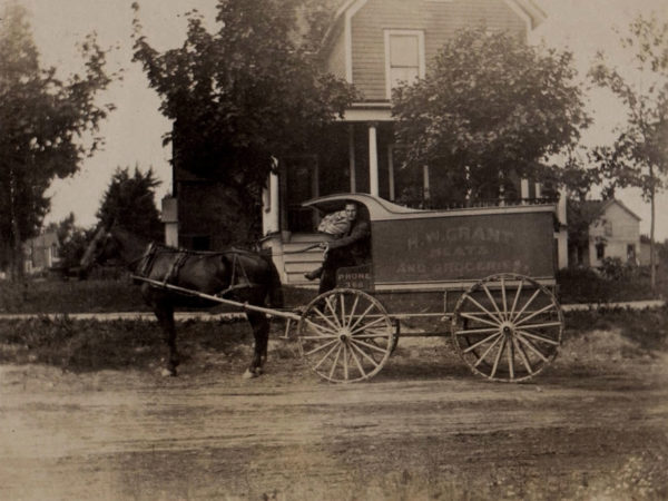 H. W. Grant grocery wagon on Cooper Street in Watertown