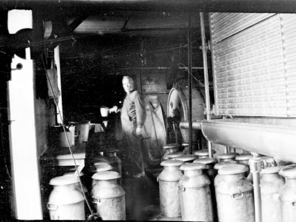 John Duncan Currie in his creamery at Aubrey Corners