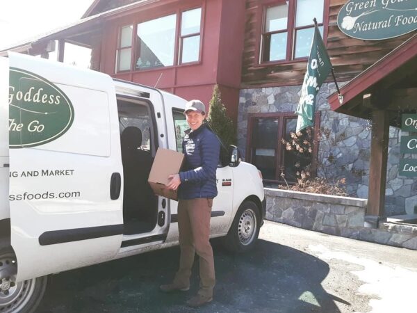 Loading box into delivery van