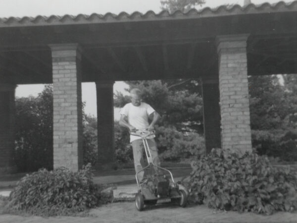 Gerald Heath with push mower