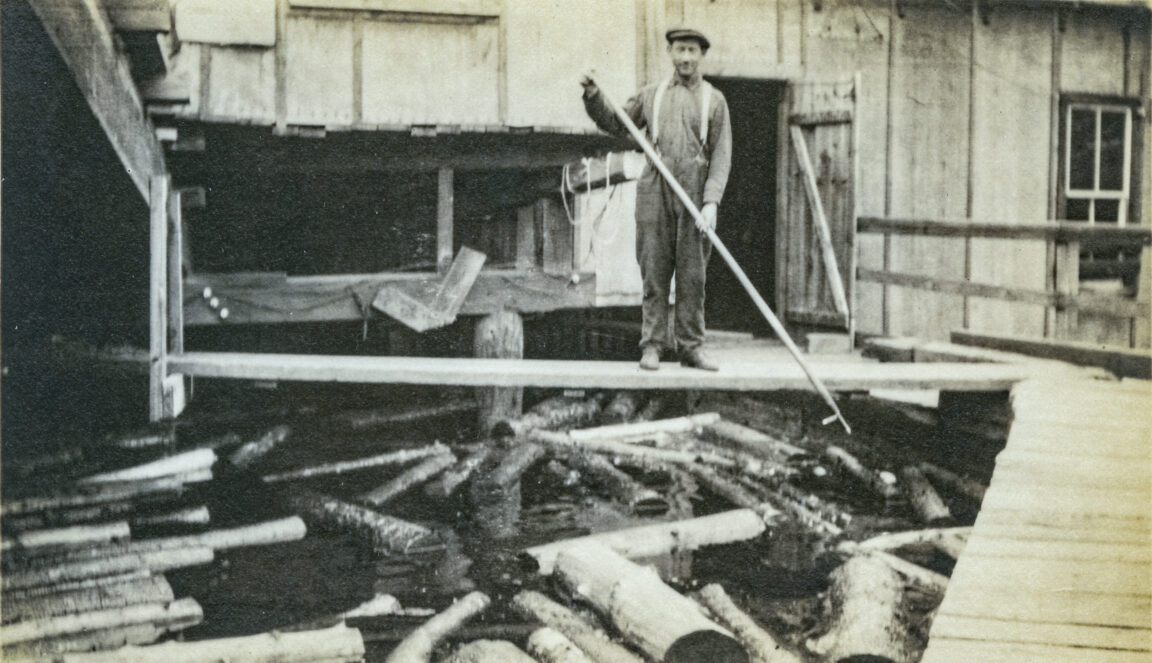 Floating logs into J&J Rogers Company mill in Au Sable Forks